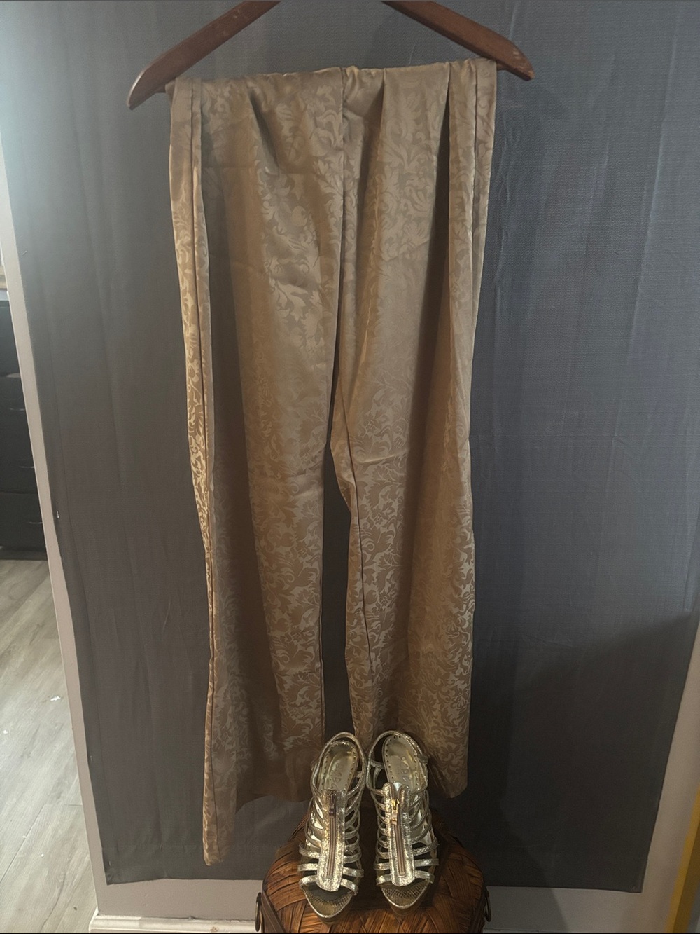 Tan colored Elegant Patterned bell bottom with flare. Be the life of the party